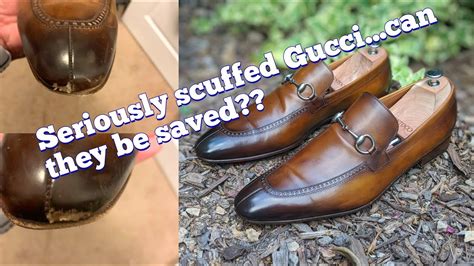 scuffed gucci loafers